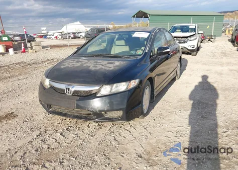 2009 Honda Civic Hybrid from USA, damaged, VIN JHMFA36259S002604